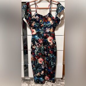 Beautiful unique dress with floral print. Size XS.